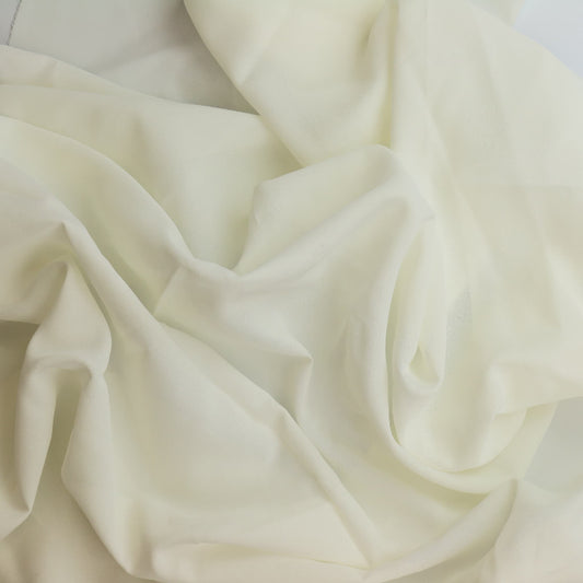 Off-white lightweight crepe fabric showing drape