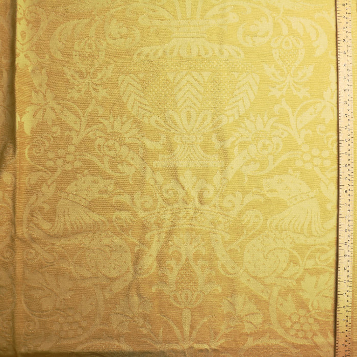 Gold bird print home décor chenille fabric laid flat