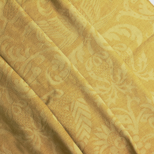 Gold bird print home décor chenille fabric folded