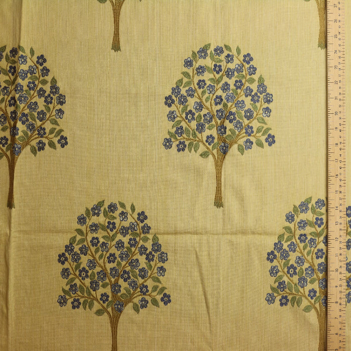 Gold tree print home décor jacquard fabric laid flat