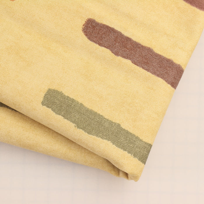 Red, orange and gold home décor canvas fabric showing detail