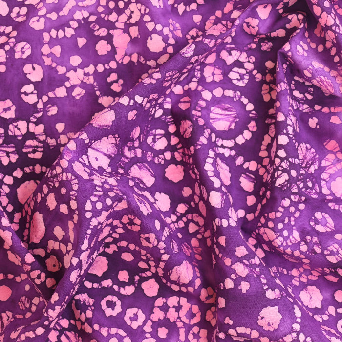 Purple and pink batik cotton fabric showing drape