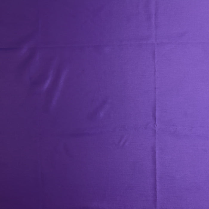 Purple polyester lining fabric laid flat