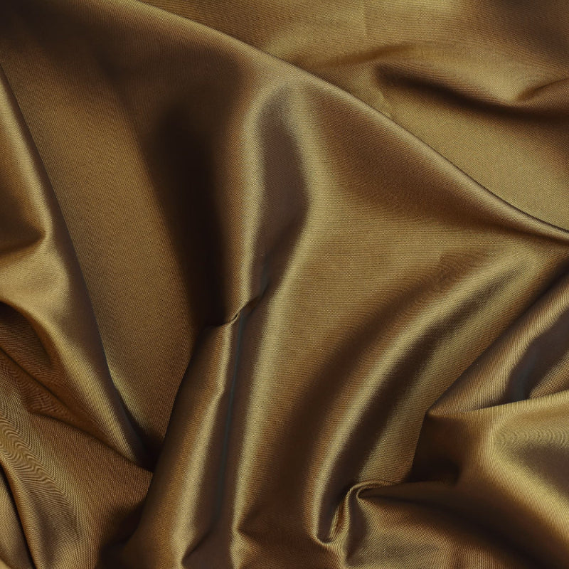 Bronze faux silk shantung fabric showing texture and drape