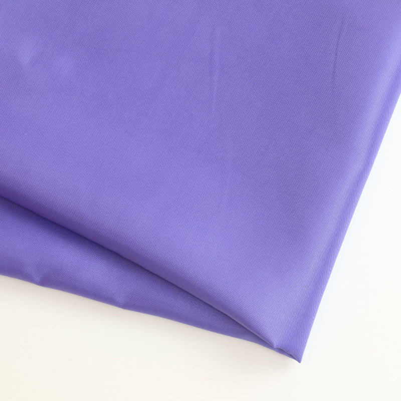 Violet taffeta lining fabric folded showing detail